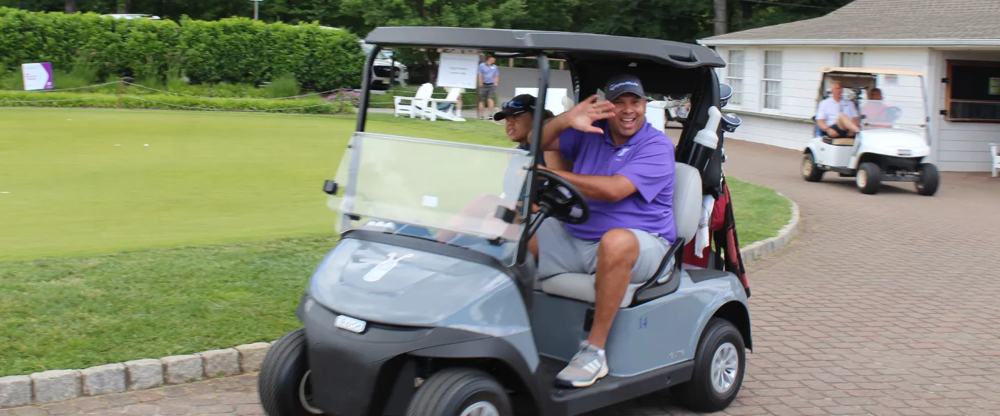 Golfers on cart