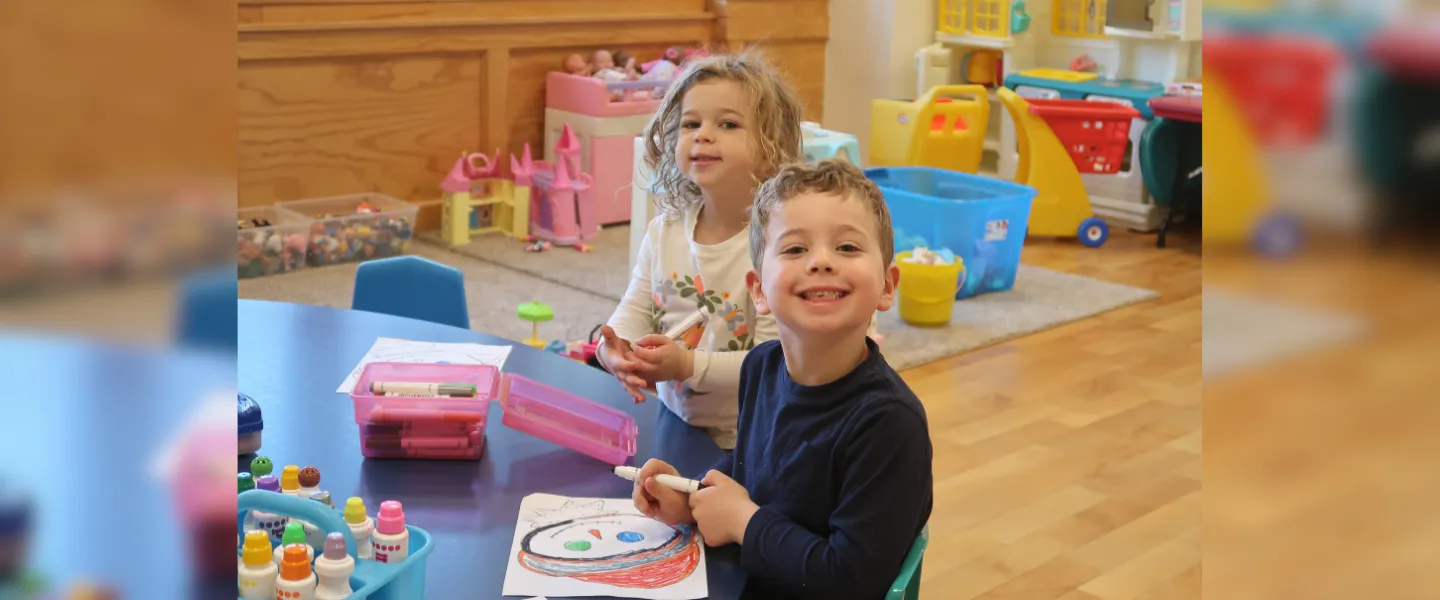 Children smiling at the camera