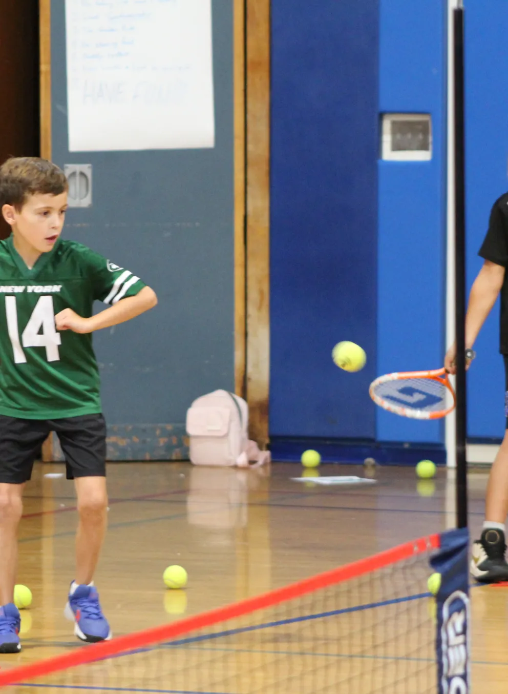 Sports Campers Playing Tennis