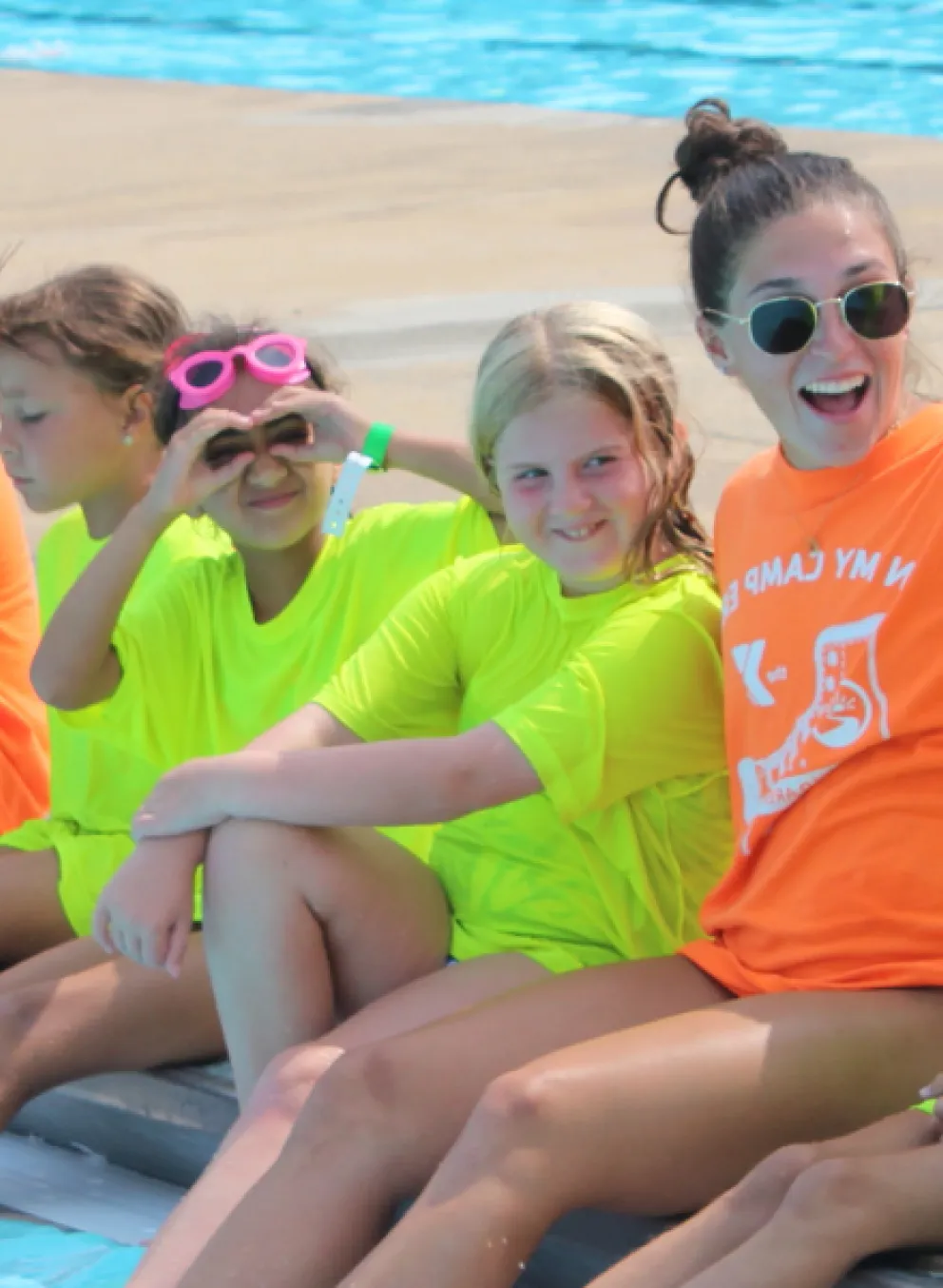 Pioneer campers and counselors at the outdoor pool