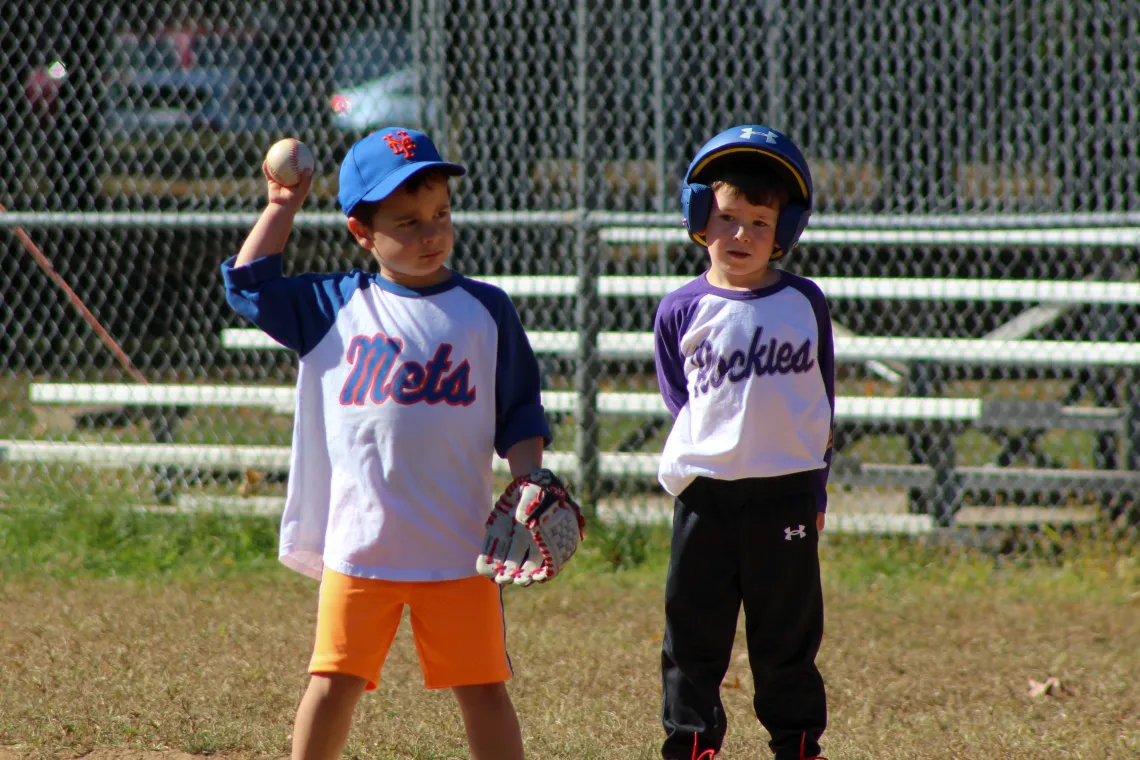 Two boys in the t-ball field